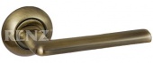 Ручка дверная RENZ NEW DH (N) 19-08 AB "Тренто", бронза античная